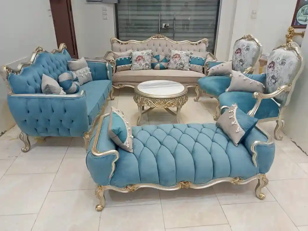 A complete living room set, five pieces and a table